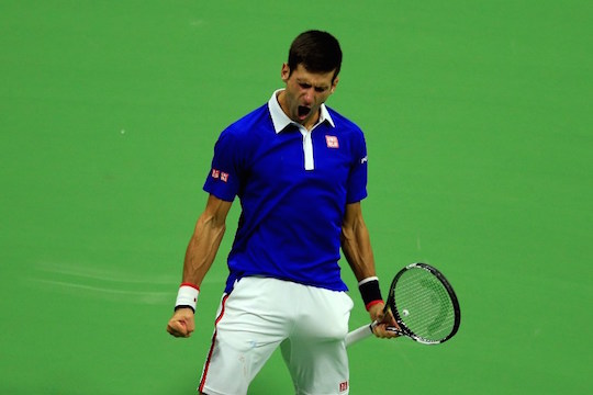 NEW YORK, NY - SEPTEMBER 13: Novak Djokovic of Serbia celebrates a point against Roger Federer of Switzerland during their Men's Singles Final match on Day Fourteen of the 2015 U.S. Open at the USTA Billie Jean King National Tennis Center on September 13, 2015 in the Flushing neighborhood of the Queens borough of New York City. Chris Trotman/Getty Images for the USTA/AFP