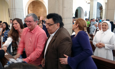  Calixto Ortega, magistrado del Tribunal Supremos de Justicia, compartióo asiento, saludos y “el abrazo de la paz” con el presidente de Fedecámaras, Francisco Martínez.