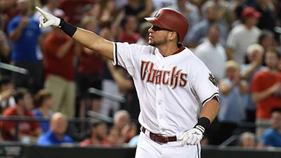 PHOENIX, AZ - AUGUST 11:  David Peralta #6 of the Arizona Diamondbacks points to the crowd after hitting a second inning grand slam home run against the Philadelphia Phillies at Chase Field on August 11, 2015 in Phoenix, Arizona.  (Photo by Norm Hall/Getty Images)