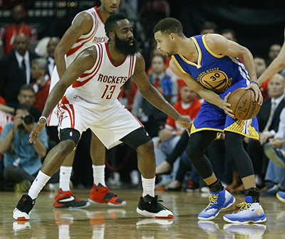HOUSTON, TX - APRIL 24: Stephen Curry #30 of the Golden State Warriors looks to drive on James Harden #13 of the Houston Rockets at Toyota Center on April 24, 2016 in Houston, Texas. NOTE TO USER: User expressly acknowledges and agrees that, by dowloading and/or using this photograph, user is consenting to the terms and conditions of the Getty Images License Agreement.   Bob Levey/Getty Images/AFP
