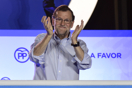  "Reclamamos el derecho a gobernar precisamente porque hemos ganado las elecciones", lanzó Rajoy desde la sede de su partido en Madrid. AFP / JOSE JORDAN 