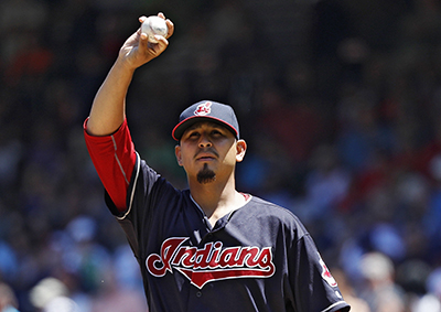 CLEVELAND, OH - JULY 27: Carlos Carrasco #59 of the Cleveland Indians pauses before pitching in the third inning against the Washington Nationals at Progressive Field on July 27, 2016 in Cleveland, Ohio. The Nationals defeated the Indians 4-1.   Joe Robbins/Getty Images/AFP