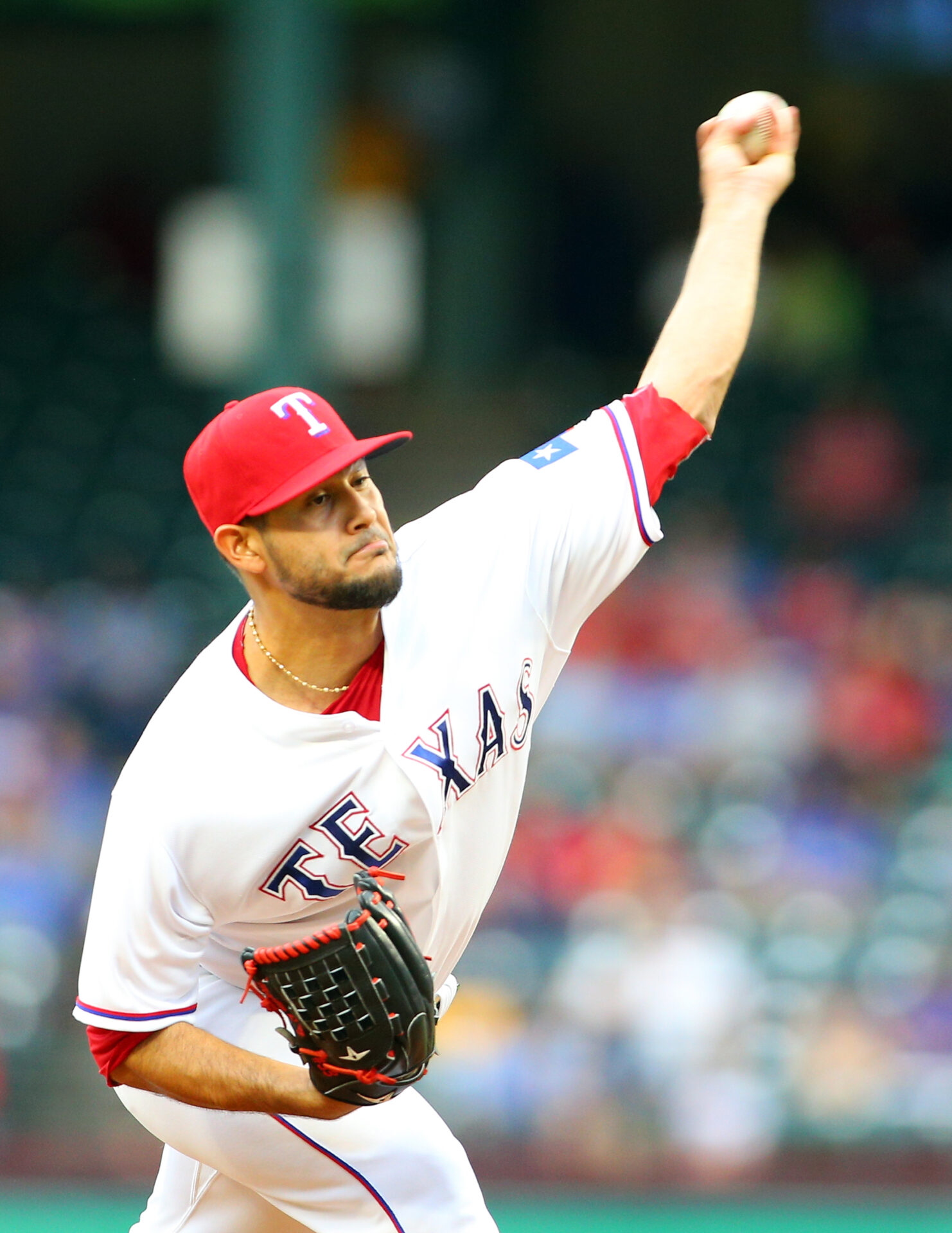 ARLINGTON, TX - AUGUST 15: Martin Perez #33 of the Texas Rangers throws in the first inning against the Oakland Athletics at Globe Life Park in Arlington on August 15, 2016 in Arlington, Texas. Rick Yeatts/Getty Images/AFP