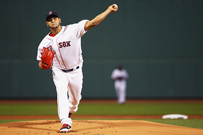 BOSTON, MA - SEPTEMBER 15: Eduardo Rodriguez #52 of the Boston Red Sox pitches against the New York Yankees during the first inning at Fenway Park on September 15, 2016 in Boston, Massachusetts.   Maddie Meyer/Getty Images/AFP