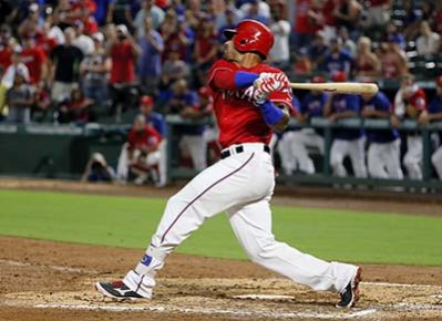 Texas Rangers' Ian Desmond follows through on a run-scoring single off a pitch from Los Angeles Angels' Jose Alvarez in the ninth inning of a baseball game, Monday, Sept. 19, 2016, in Arlington, Texas. The hit scored Elvis Andrus in the 3-2 Rangers win. (AP Photo/Tony Gutierrez)