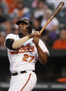 FILE - In this Aug. 13, 2011, file photo, Baltimore Orioles designated hitter Vladimir Guerrero hits a two-run home run in the second inning of a baseball game against the Detroit Tigers in Baltimore. The Toronto Blue Jays signed the 37-year-old to a minor league contract, which will start with an extended spring training program. (AP Photo/Patrick Semansky, File)